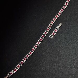 Vintage Avon Silver Tone Ruby Red Rhinestone Tennis Bracelet